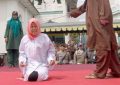 Woman Severely Caned In Public in Indonesia for Being Too Close to a Man Who Is Not Her Husband