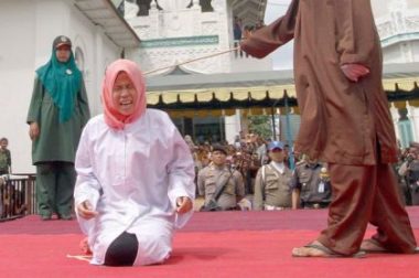 Woman Severely Caned In Public in Indonesia for Being Too Close to a Man Who Is Not Her Husband