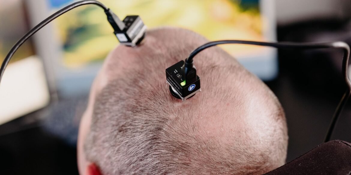 The Download: the first brain implant power user and South Korea’s AI obsession